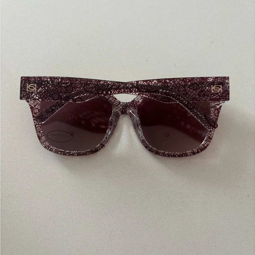 bebe Women's Burgundy Lace Patterned Oversized Sunglasses
